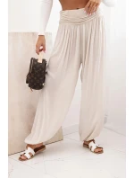 Dámské viskózové kalhoty s širokými nohavicemi a volánky béžový