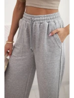 Dámské bavlněné cargo kalhoty s kapsami a řetízkem béžové