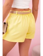 Dámské sukňové šortky se sklady a páskem žlutý