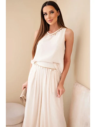 Dámský komplet s viskózou, top bez rukávů a kalhoty se širokou nohavicí a ozdobným zakončením béžový