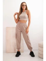 Dámské bavlněné cargo kalhoty s kapsami a řetízkem béžové