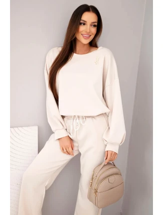 Dámský komplet máslová mikina s broží a kalhoty s rovnou nohavicí béžový