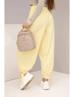 Dámské kalhoty s širokým nohavicím a zavazováním dole žluté