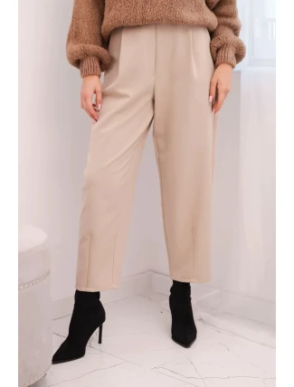 Dámské kalhoty s vysokým pasem a sklady béžové Dámské kalhoty s vysokým pasem a sklady béžové