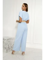 Kombinéza s ozdobným páskem v pase modrá Kombinéza s ozdobným páskem v pase modrá