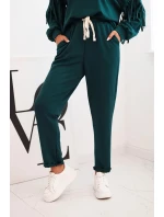 Dámský komplet máslový s třásněmi na rukávech mořský