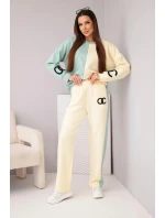 Dámský teplákový komplet Masełko dvoubarevný s oversized mikinou a rovnými kalhotami tmavě mátová+žlutá