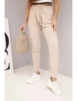 Dámské tepláky s elastickým pasem a šňůrkou béžové