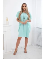 Šaty s kapsami a přívěskem světle mátová